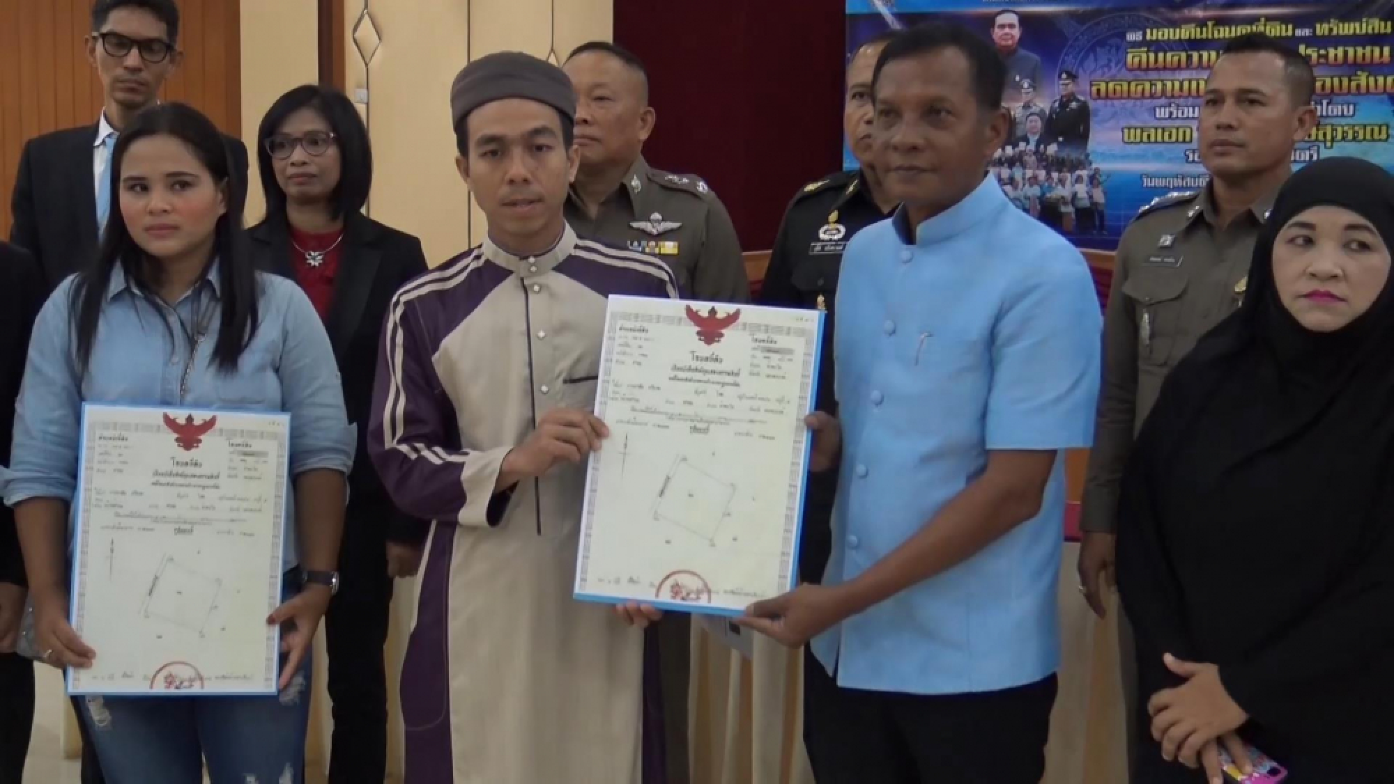 Loan-shark victims get land back