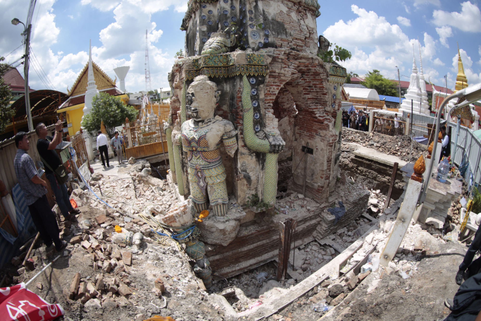 Workers hurt as historic tower falls during restoration at Bangkok temple