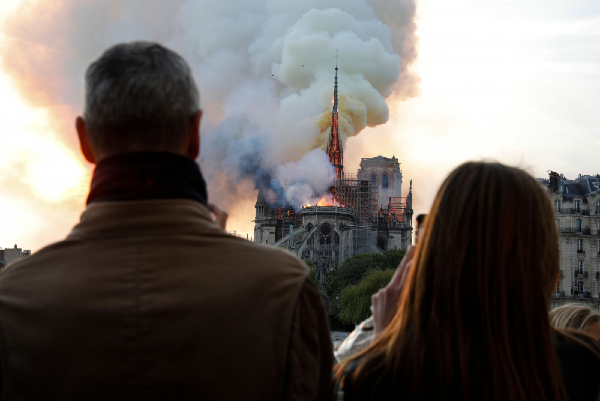 'Paris is disfigured': Tears and shock as Notre-Dame burns