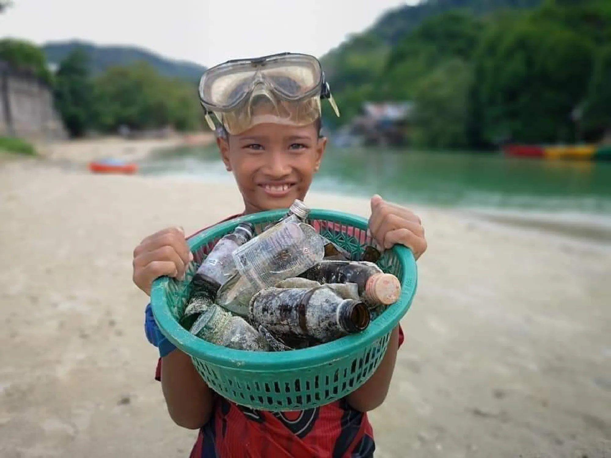 Young Patong hero rewarded for collecting garbage from filthy canal
