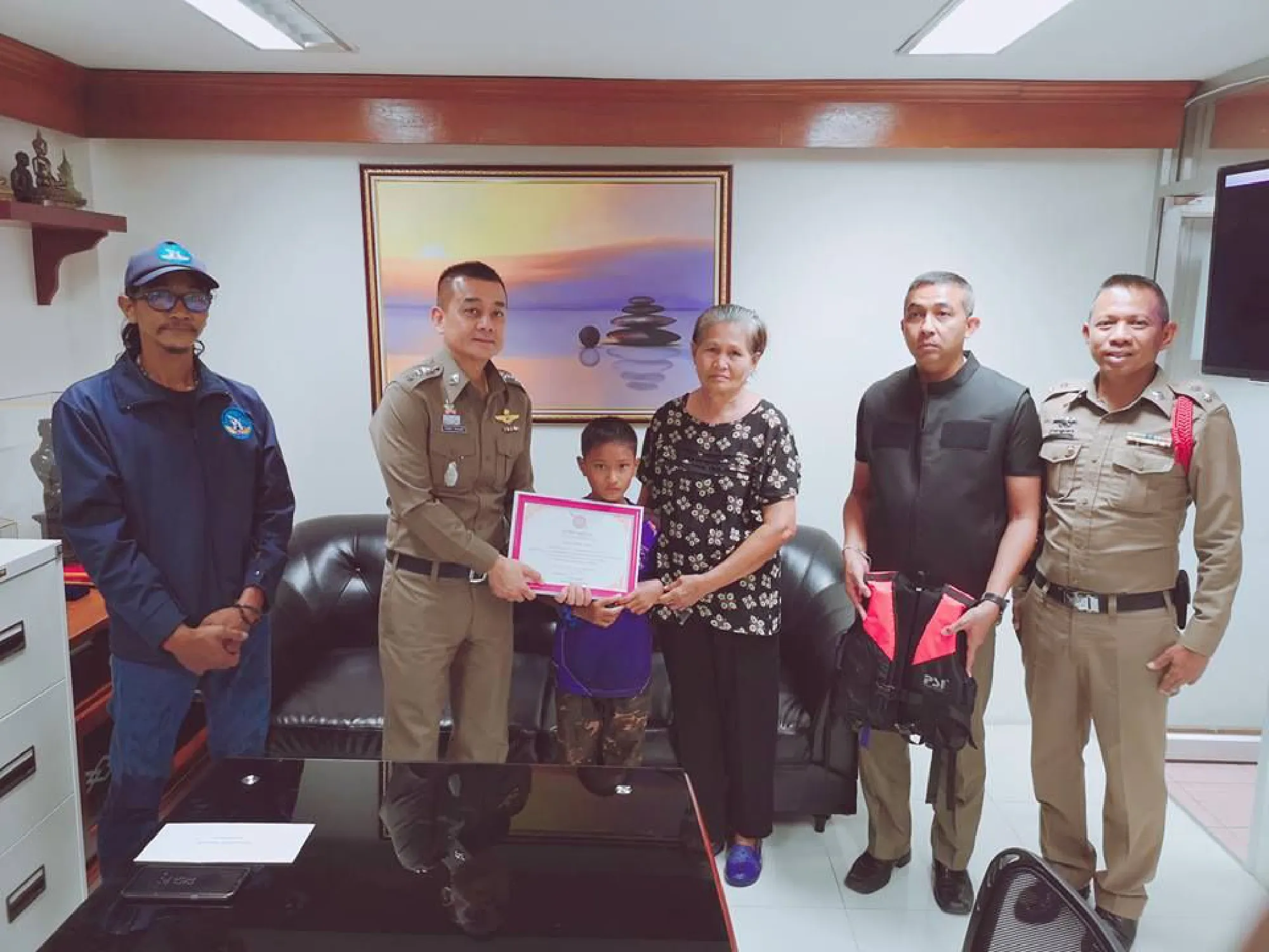 Young Patong hero rewarded for collecting garbage from filthy canal