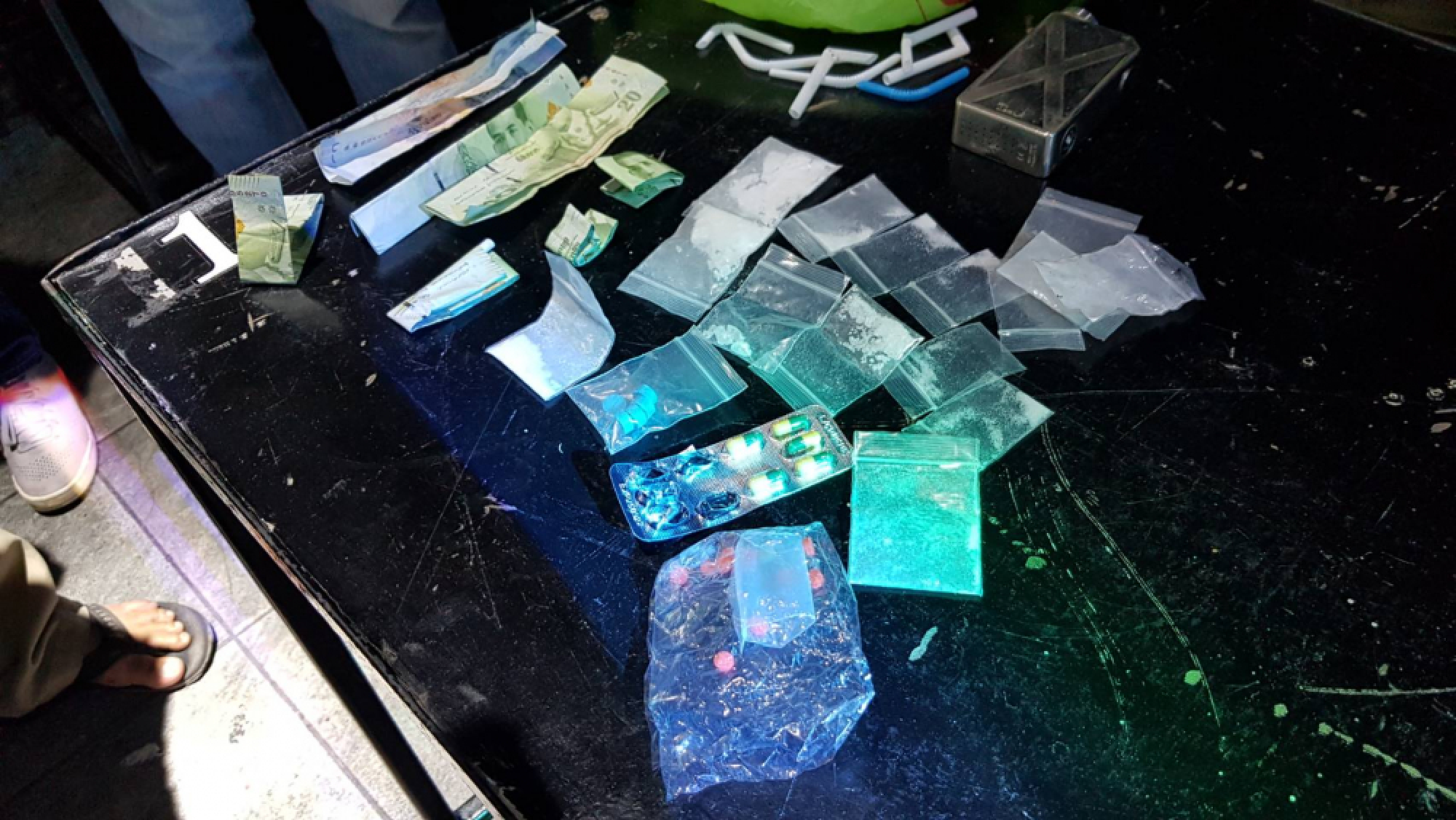 Drugs, underage drinkers found in Bangkok club raid