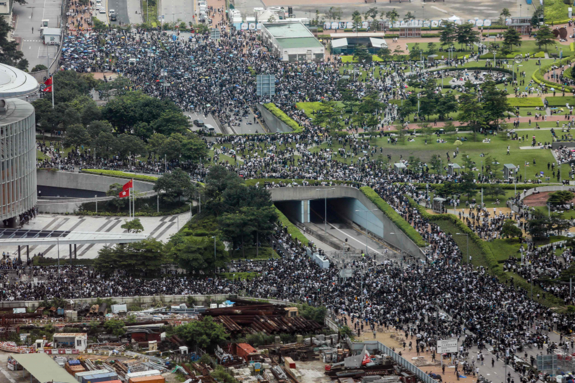 Hong Kong police use tear gas as protesters try to storm parliament