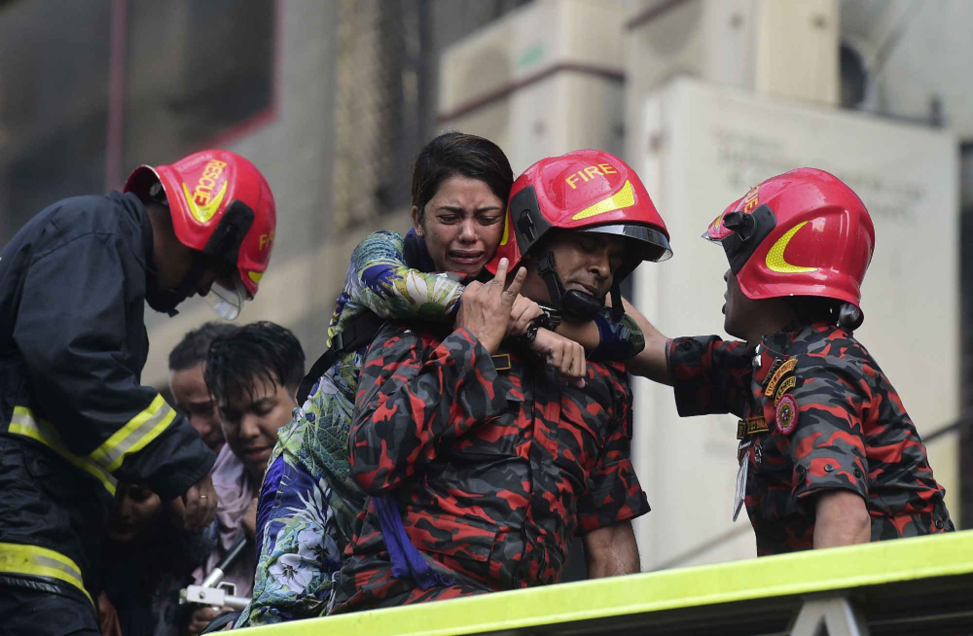 Workers jump to their deaths as Dhaka office block fire kills seven