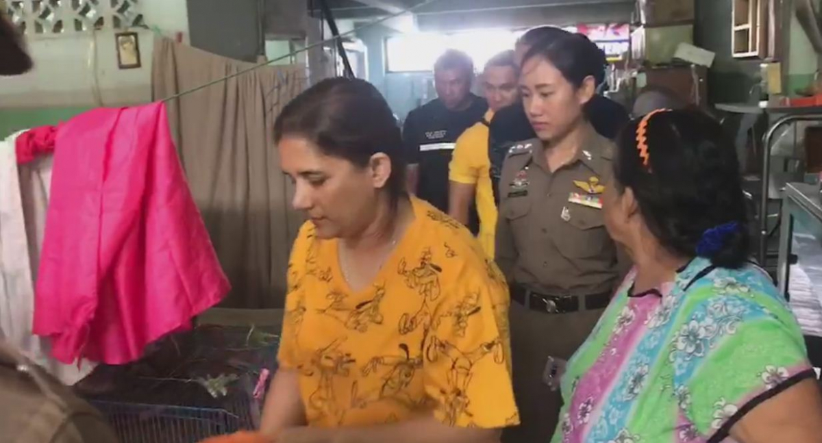 Singh is escorted to Sri Racha Police Station