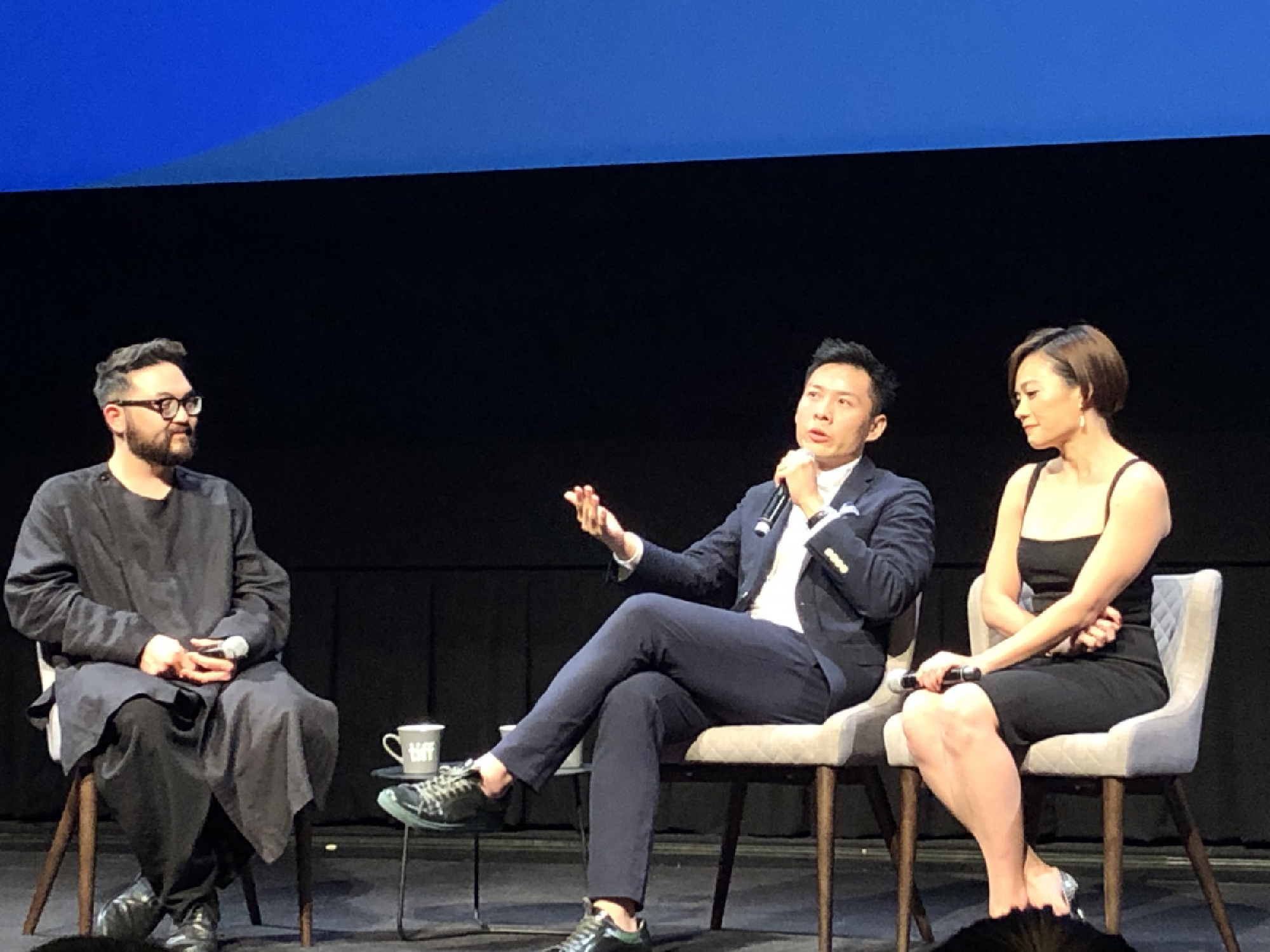 Anthony Chen, centre, at Toronto International Film Festival.
