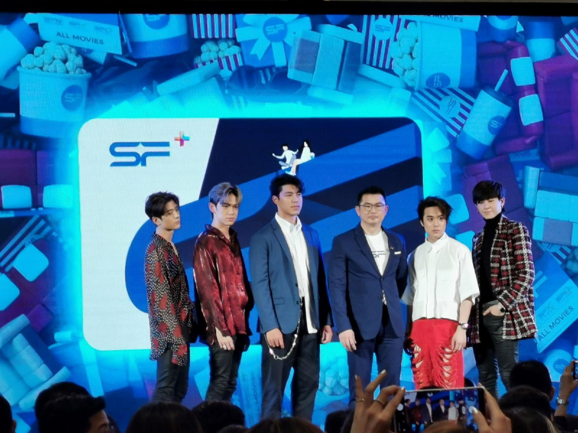 Group photo with Trinity, a famous Thai boy band.