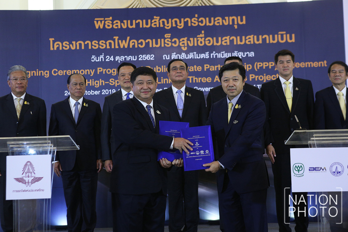 Suphachai (front row right) at the contract signing ceremony on Thursday (Oct. 24)