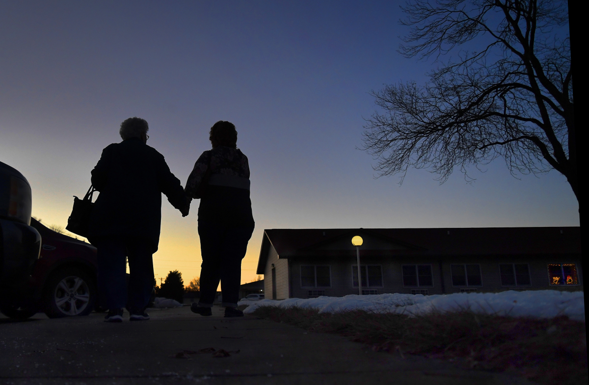 Marlene Kennedy, left, and her daughter Deb Kennedy at Emerald Nursing & Rehab in Cozad, Neb., after visiting Marlene's husband and Deb's father, Earl Kennedy, a resident there. MUST CREDIT: Washington Post photo by Michael S. Williamson