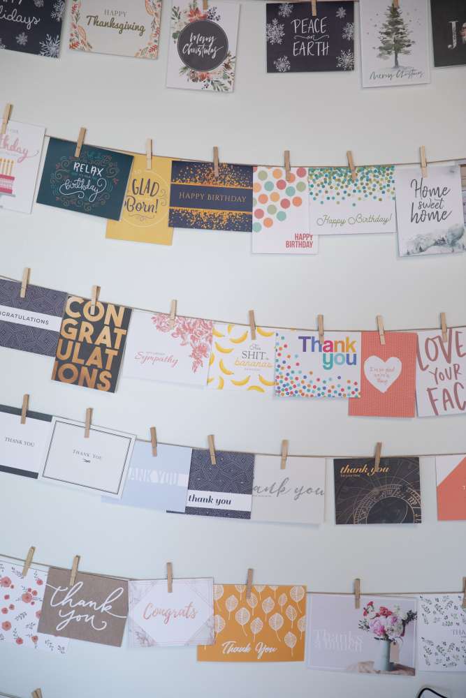 A variety of cards hang on the wall in Handwrytten's shop. MUST CREDIT: Photo for The Washington Post by Davis Winborne