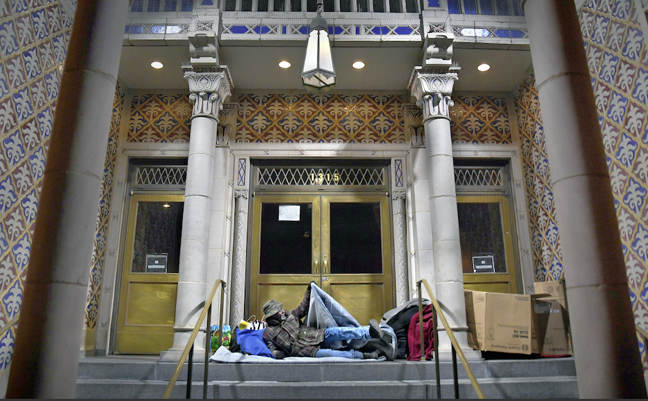 Robert Fox spent the night opposite Franklin Square park on the steps of the Sphinx Club at Almas Temple in Washington, D.C. MUST CREDIT: Washington Post photo by Michael S. Williamson