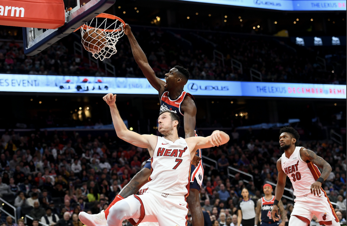 Washington Wizards center Ian Mahinmi dunks on Miami Heat guard Goran Dragic on Monday, Dec. 30, 2019. MUST CREDIT: Washington Post photo by Katherine Frey