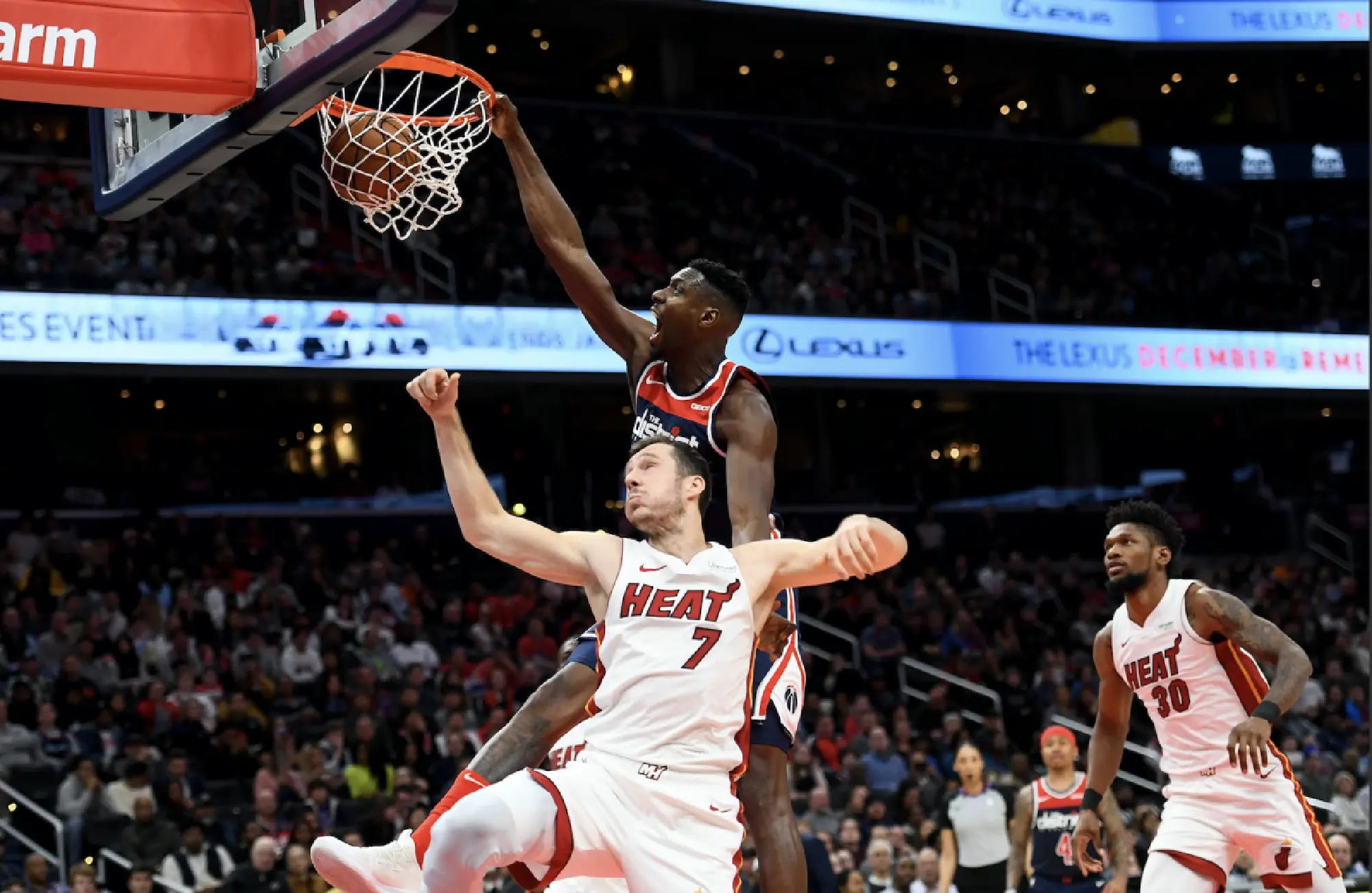 Washington Wizards center Ian Mahinmi dunks on Miami Heat guard Goran Dragic on Monday, Dec. 30, 2019. MUST CREDIT: Washington Post photo by Katherine Frey