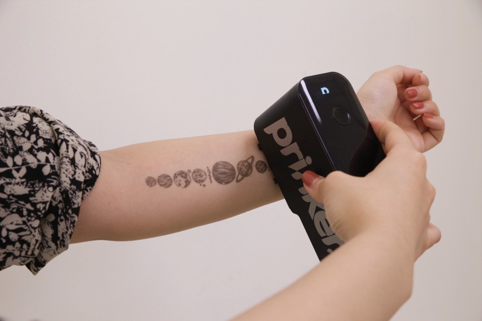 Prinker mobile temporary tattoo printer can instantly print graphics on your skin. MUST CREDIT: Prinker handout photo. 