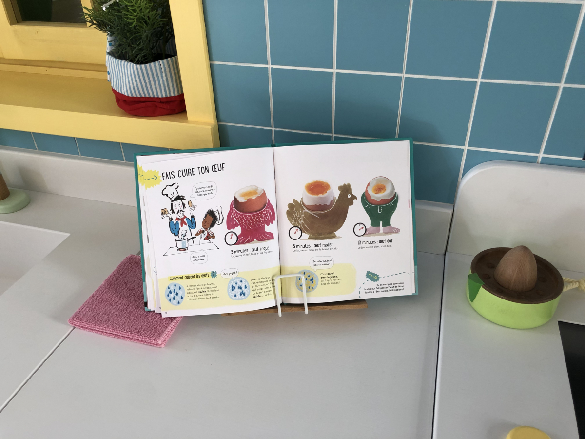 In the children's section of the Cité, a kid-size kitchen features interactive exhibits such as this one about how to follow a recipe. MUST CREDIT: Washington Post photo by Sylvie Bigar