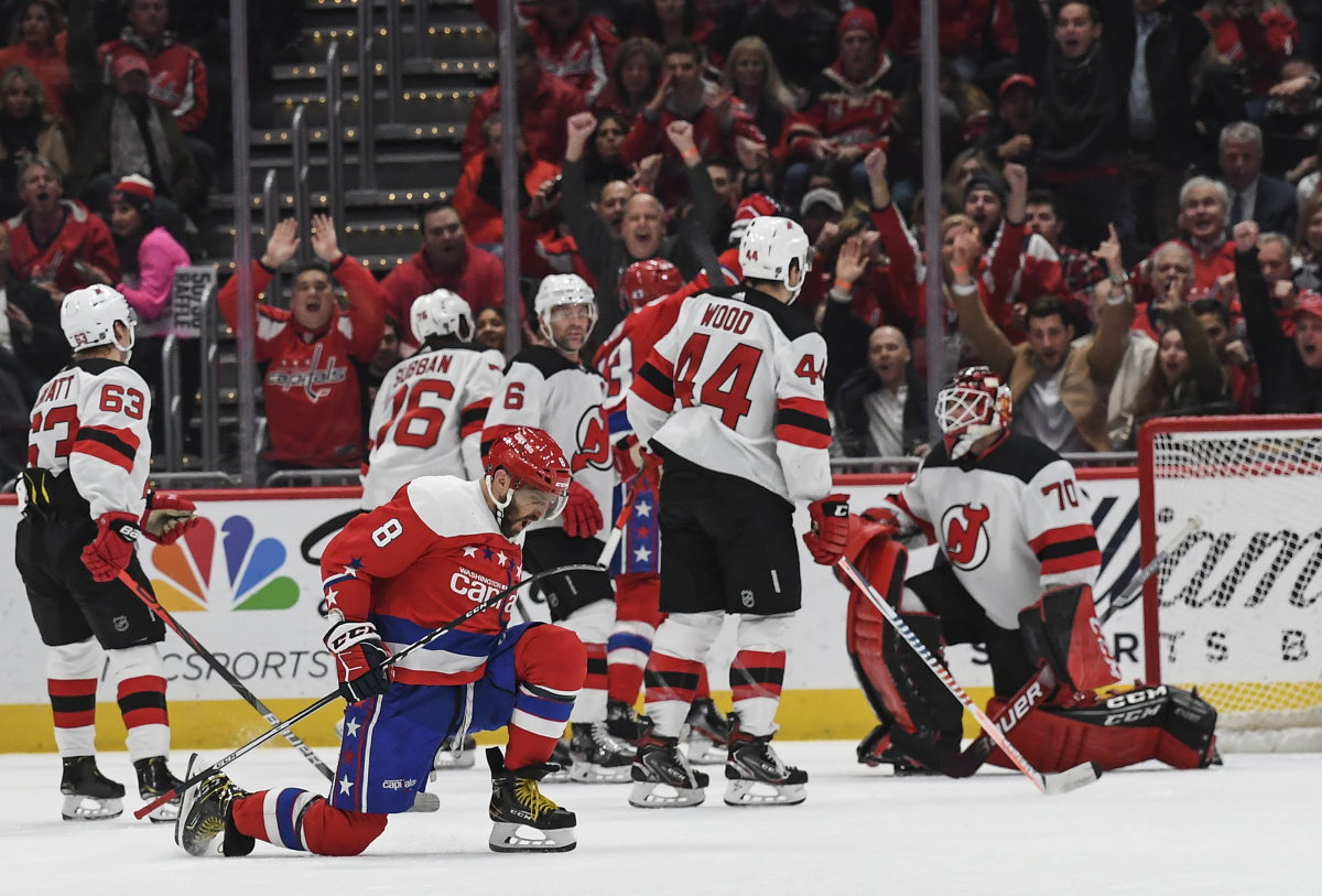 Capitals left wing Alex Ovechkin (8) celebrates his second goal of the night during the first period of Washington's game against the New Jersey Devils at Capital One Arena on Thursday night. Ovechkin finished with a hat trick. MUST CREDIT: Washington Post photo by Toni L. Sandys