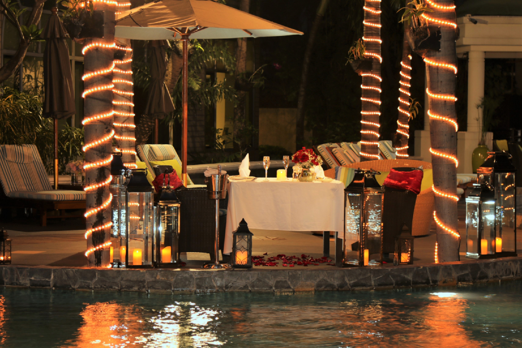 Couples invited to table by the pool for the 'Season of Love'