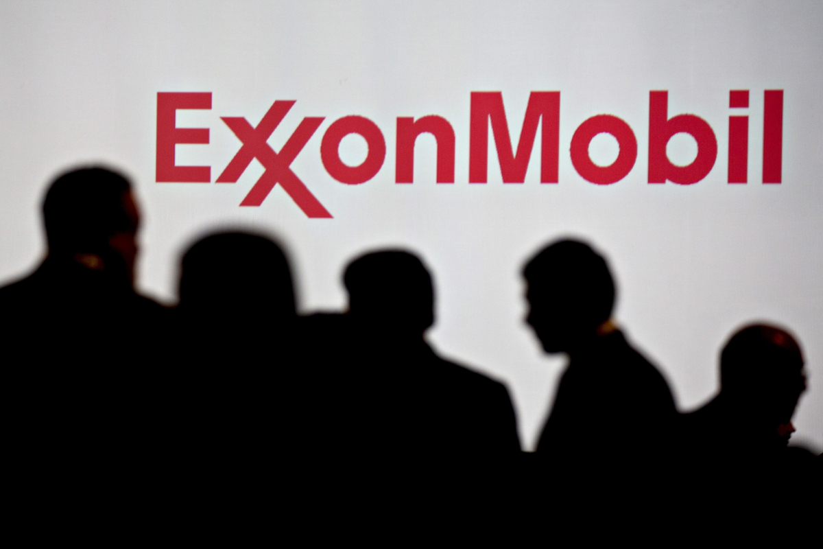 An Exxon Mobil sign at \the World Gas Conference in Washington on June 26, 2018. MUST CREDIT: Bloomberg photo by Andrew Harrer.
