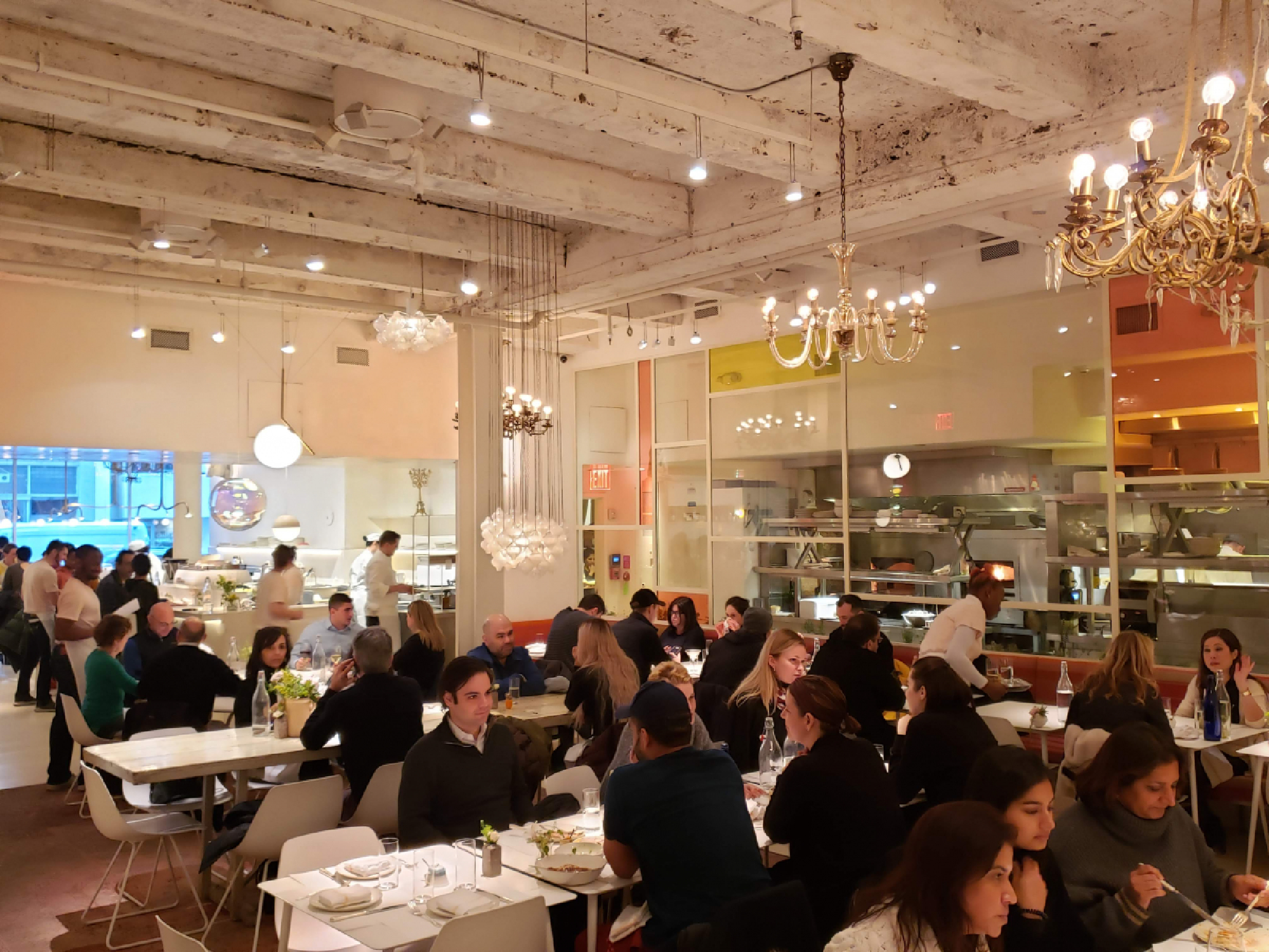 Modern design meets vintage elegance at abcV, super-chef Jean-Georges Vongerichten's vegetable-focused eatery where a glass wall separates the kitchen from the dining room. MUST CREDIT: Photo by Liza Weisstuch for The Washington Post.