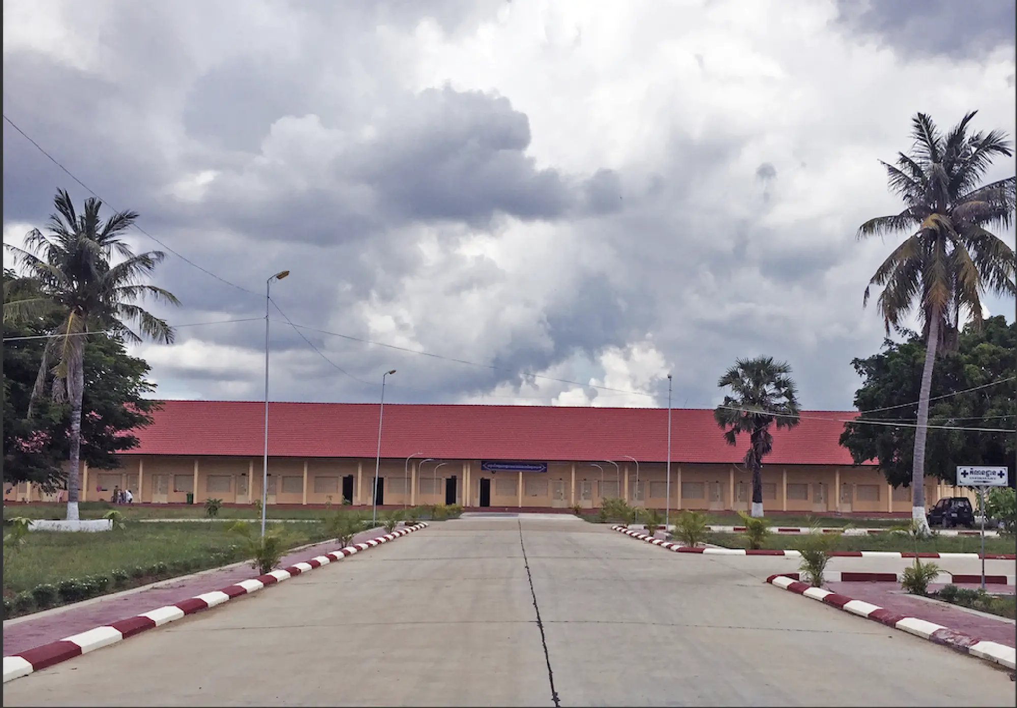 Reach Seila, left, and Nguon Kosal oversee the clinic, which is designed to house 200 people once it is fully operational, but resources are lacking. MUST CREDIT: Photo for The Washington Post by Leonie Kijewski