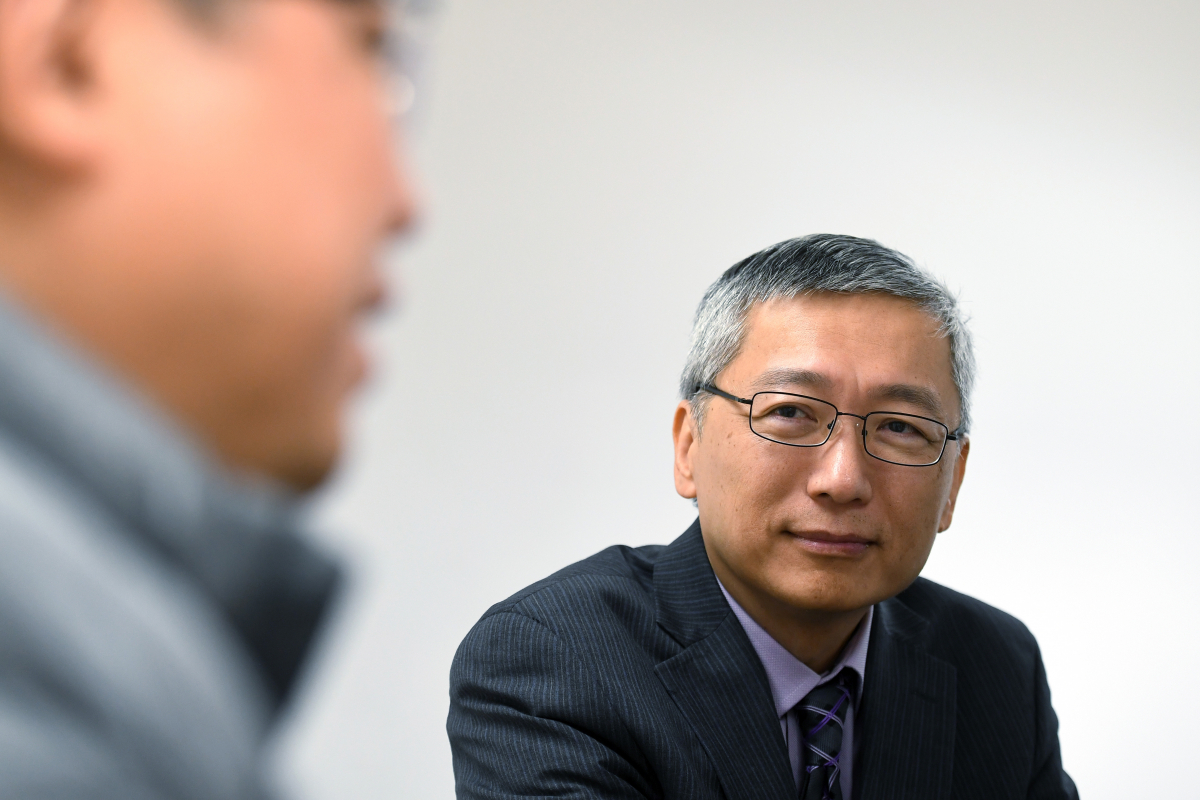 Chinese Bible Church of Maryland elders Tao Jen, left, and John Lei talk about how the congregation has dealt with the Coronavirus on Sunday, Feb. 16, 2020. MUST CREDIT: Washington Post photo by Katherine Frey