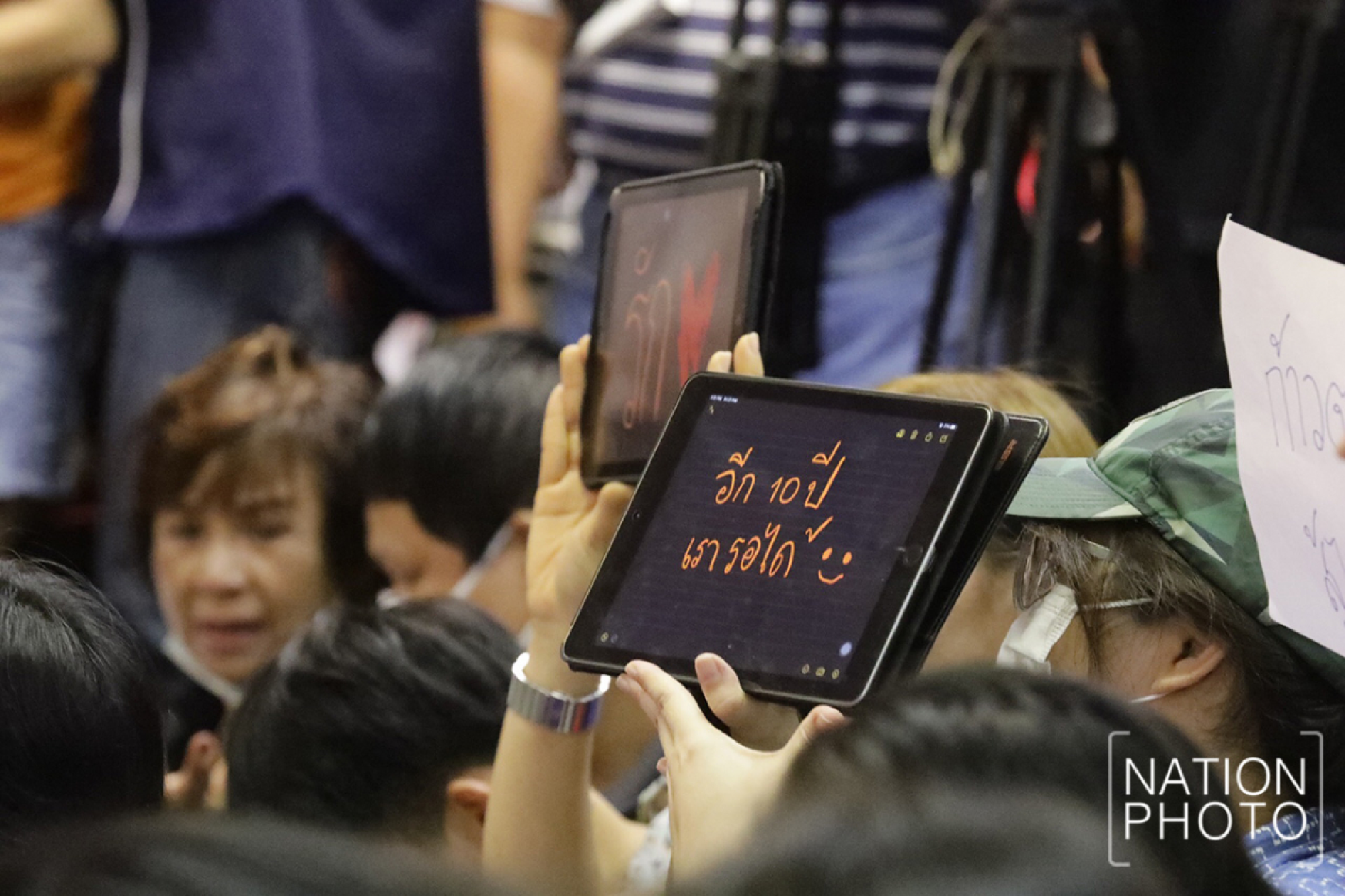 Some quietly jot down their feelings on paper or ipad.