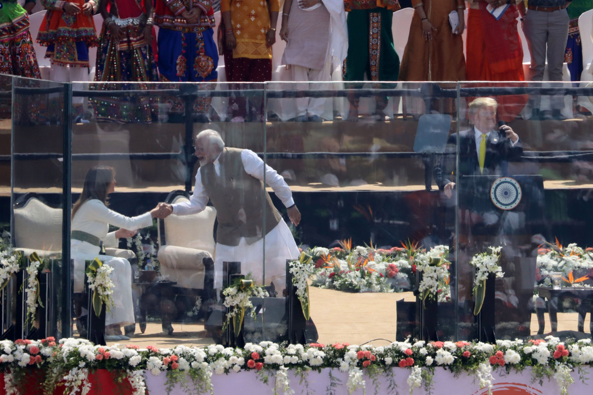 First lady Melania Trump,shakes hands with Narendra Modi, India's prime minister, as President Donald Trump addresses the 'Namaste Trump' event at the Motra Stadium in Ahmedabad, India, on Feb. 24, 2020. MUST CREDIT: Bloomberg photo by T. Narayan.