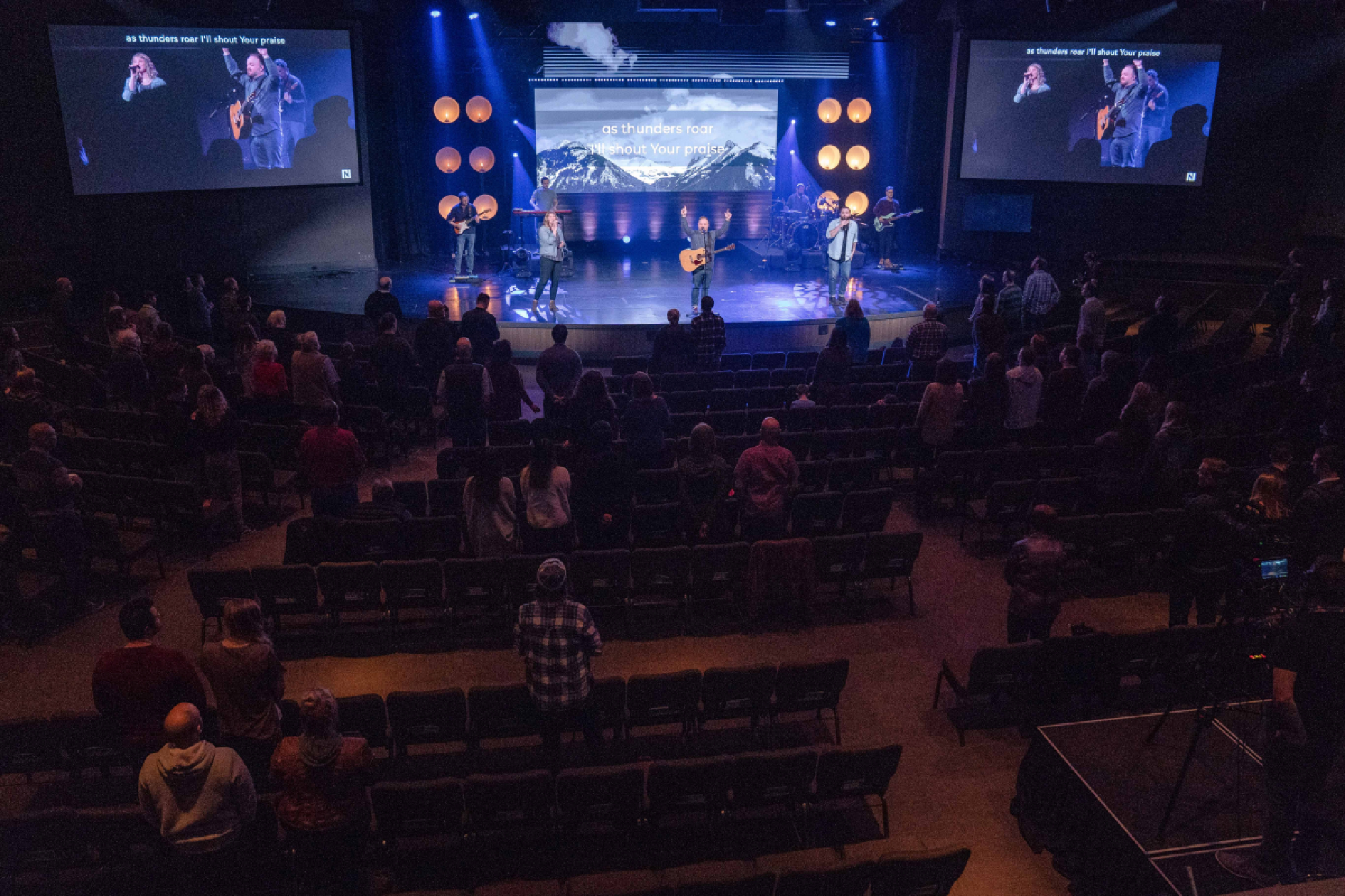 Volunteers perform at the the start of Northshore Community Church service on Sunday, March 1, 2020, in Kirkland, Washington, where officials are monitoring a possible coronavirus outbreak. MUST CREDIT: Photo for The Washington Post by Jovelle Tamayo