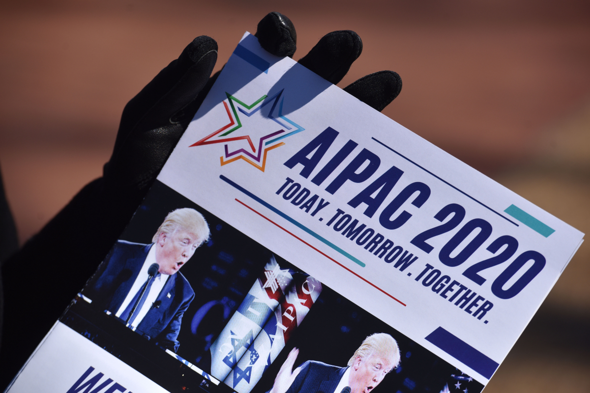Members of IfNotNow give pamphlets to people attending the American Israel Public Affairs Committee (AIPAC) annual conference on Sunday, March 1, 2020. MUST CREDIT: Washington Post photo by Marvin Joseph
