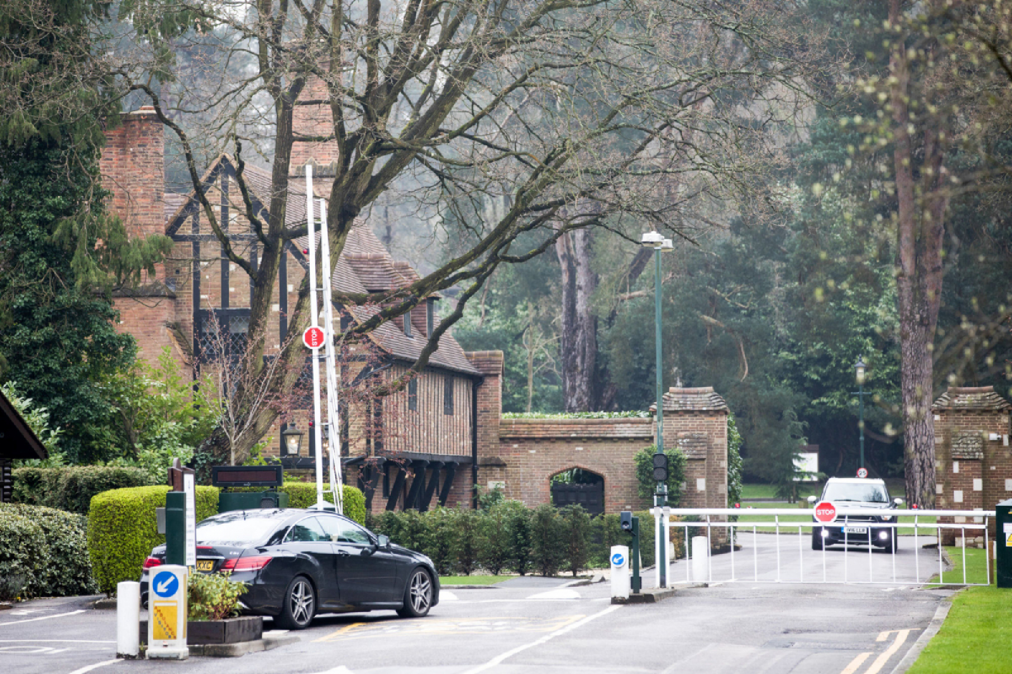 Security barriers outside St. George's Hill, one of England's most exclusive developments, where Jahangir Hajiyev owned three homes. MUST CREDIT: Bloomberg photo by Jason Alden
