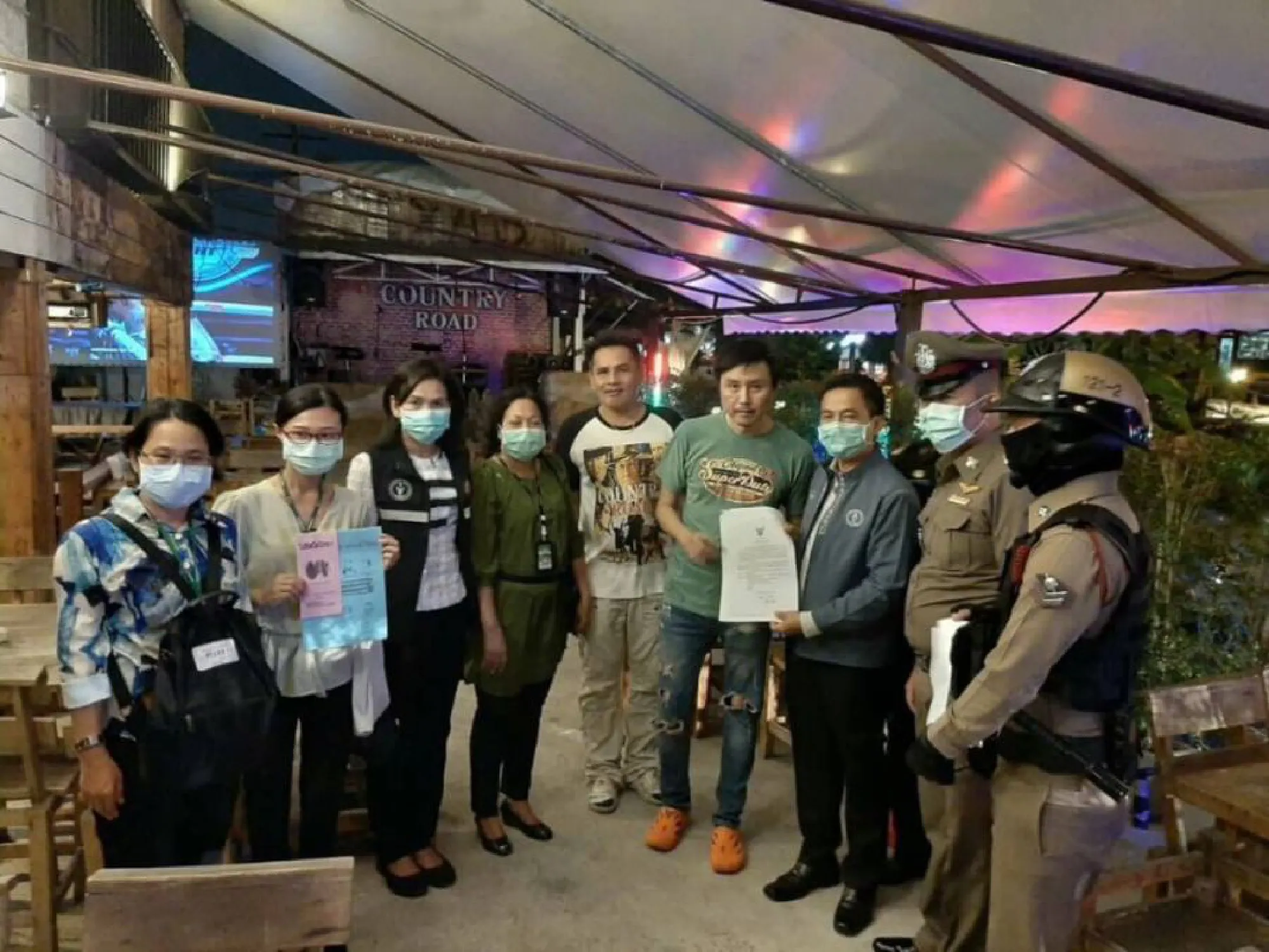 Bangkok officers check if entertainment venues heeding closure orders