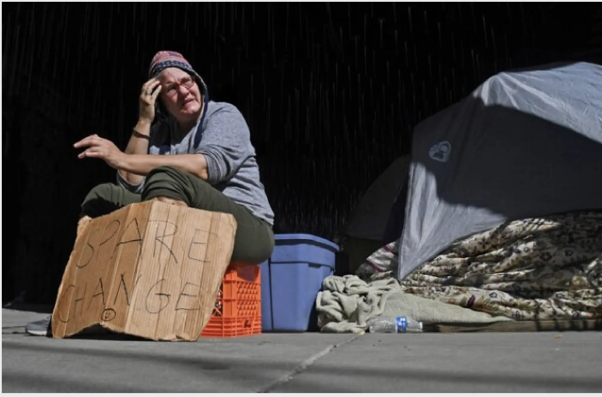 Michele Hydier, near Washington, D.C.'s Union Station on March 17, 2020, is receiving a fraction of the money she used to receive when panhandling. MUST CREDIT: Washington Post photo by Michael S. Williamson