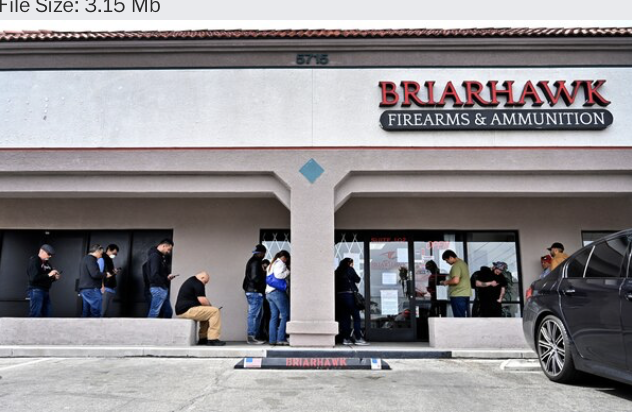 People wait in line to enter the Briarhawk Firearms and Ammunition store in Las Vegas. A sign on the door stated that only two customers were allowed inside at a time. MUST CREDIT: Photo by David Becker for The Washington Post