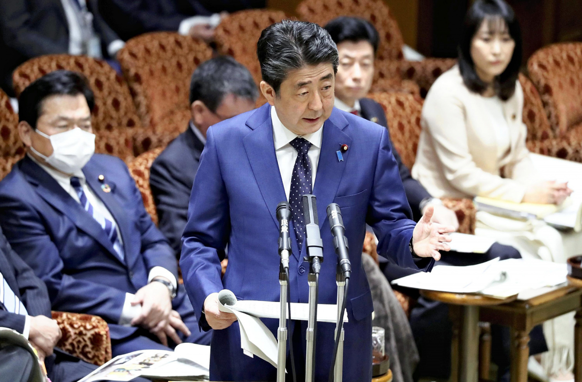 Prime Minister Shinzo Abe speaks about the possibility of postponing the Tokyo Olympics at the Japan Diet on March 23, 2020. MUST CREDIT: Japan News-Yomiuri