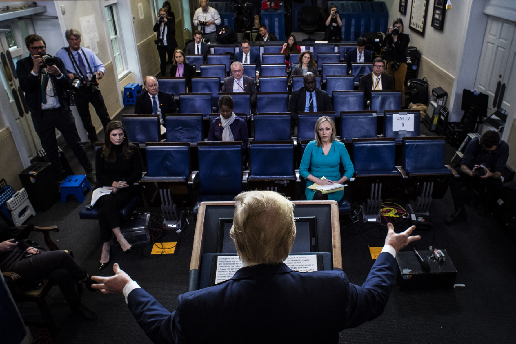 President Donald Trump delivers a coronavirus task force briefing before a social-distance-shrunken press corps on March 25. MUST CREDIT: Washington Post photo by Jabin Botsford