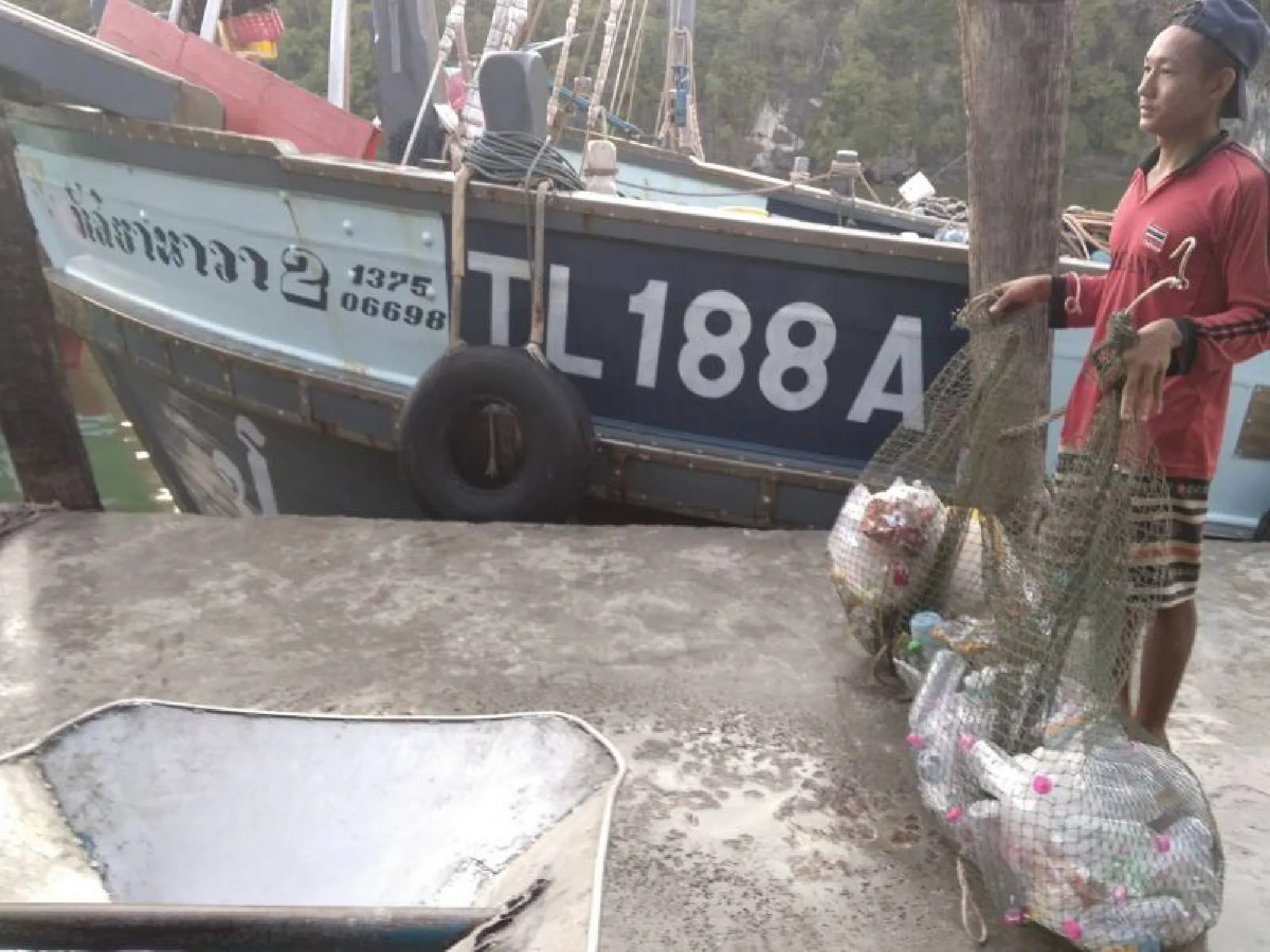 Fishermen head off to sea for a big catch of garbage