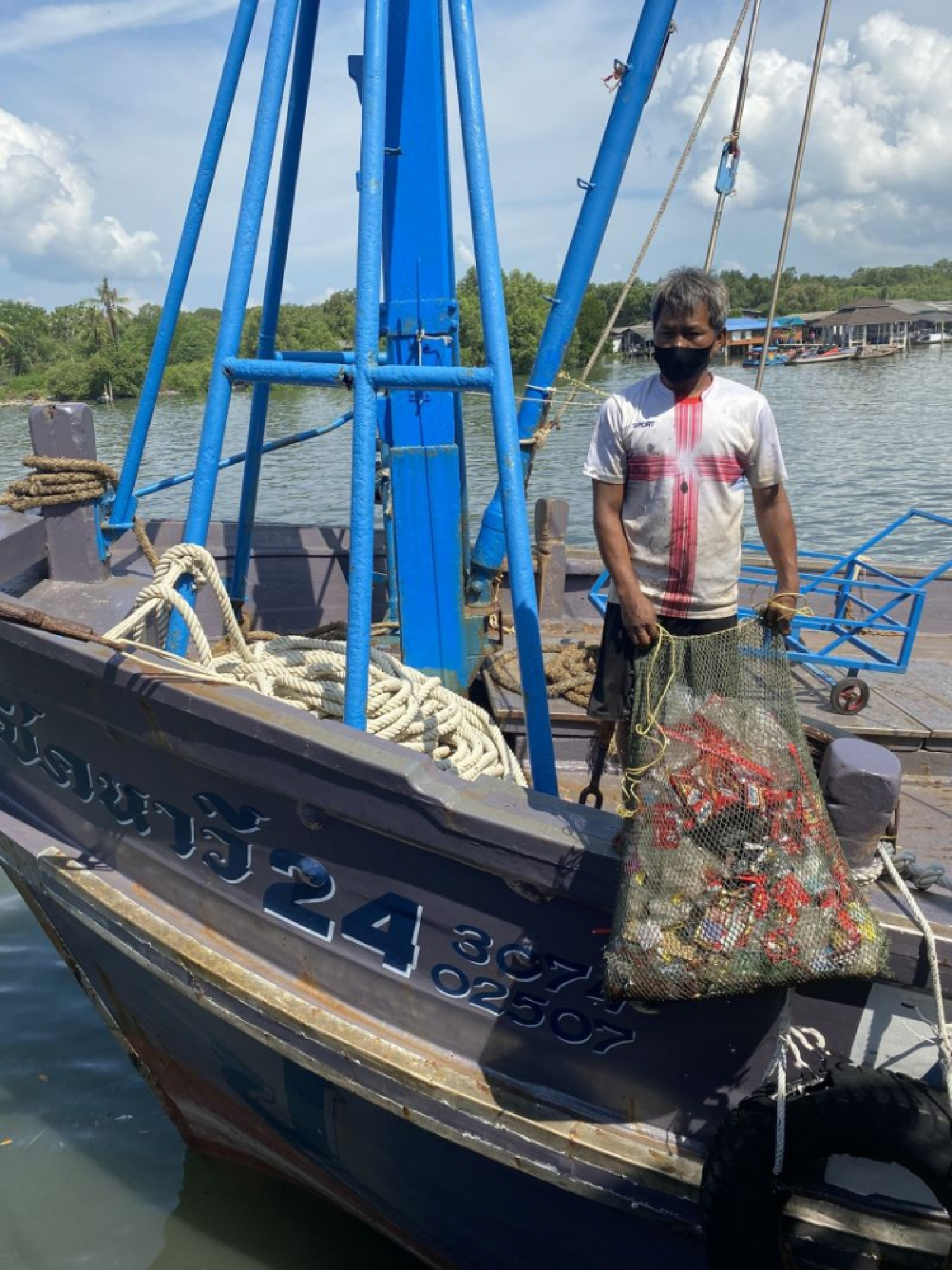 Fishermen head off to sea for a big catch of garbage