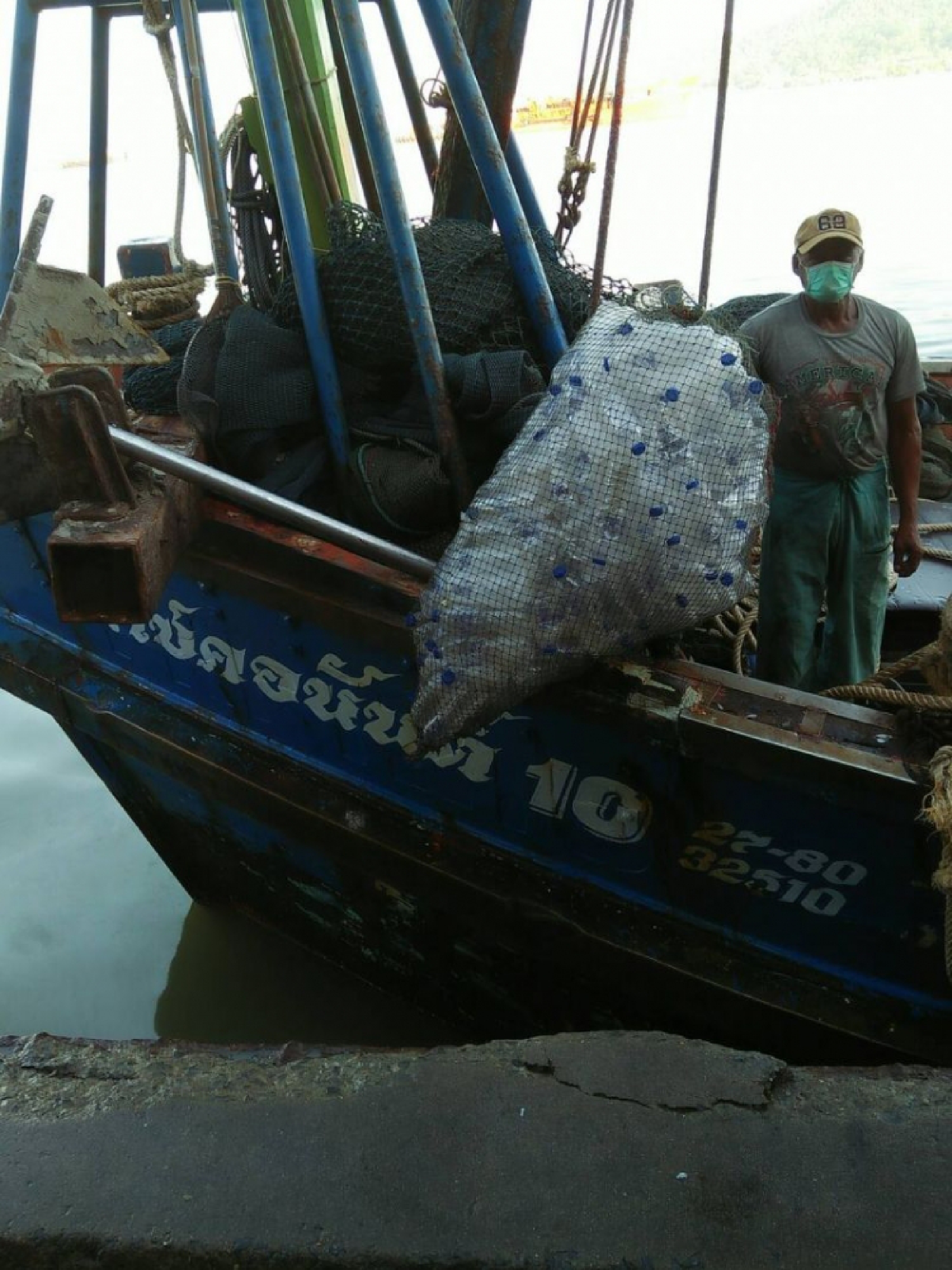 Fishermen head off to sea for a big catch of garbage