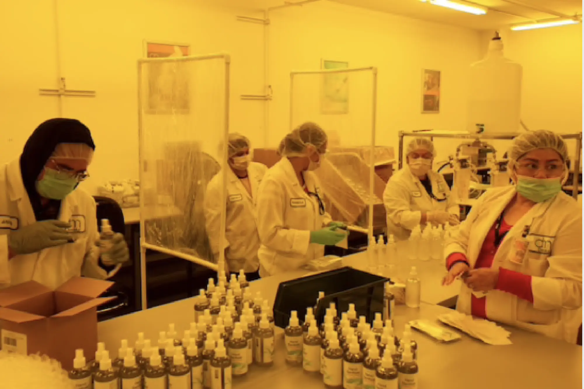 Employees of DenMat, who had been laid off, were called back to work in Lompoc, Calif. The business, which used to produce dental supplies, has been transformed to make hand sanitizer and surface cleaners during the covid-19 pandemic. MUST CREDIT: photo for The Washington Post by Karla Gachet.