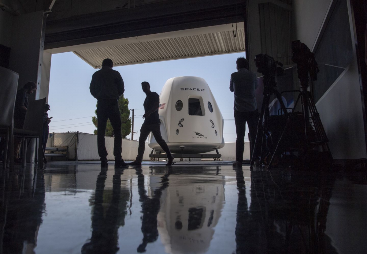 A mock-up of the SpaceX Dragon capsule for crew members is seen in 2018. Four years earlier, NASA awarded contracts to SpaceX and Boeing to ferry astronauts to the International Space Station. The first such SpaceX flight is set for later this month. MUST CREDIT: Washington Post photo by Jonathan Newton
