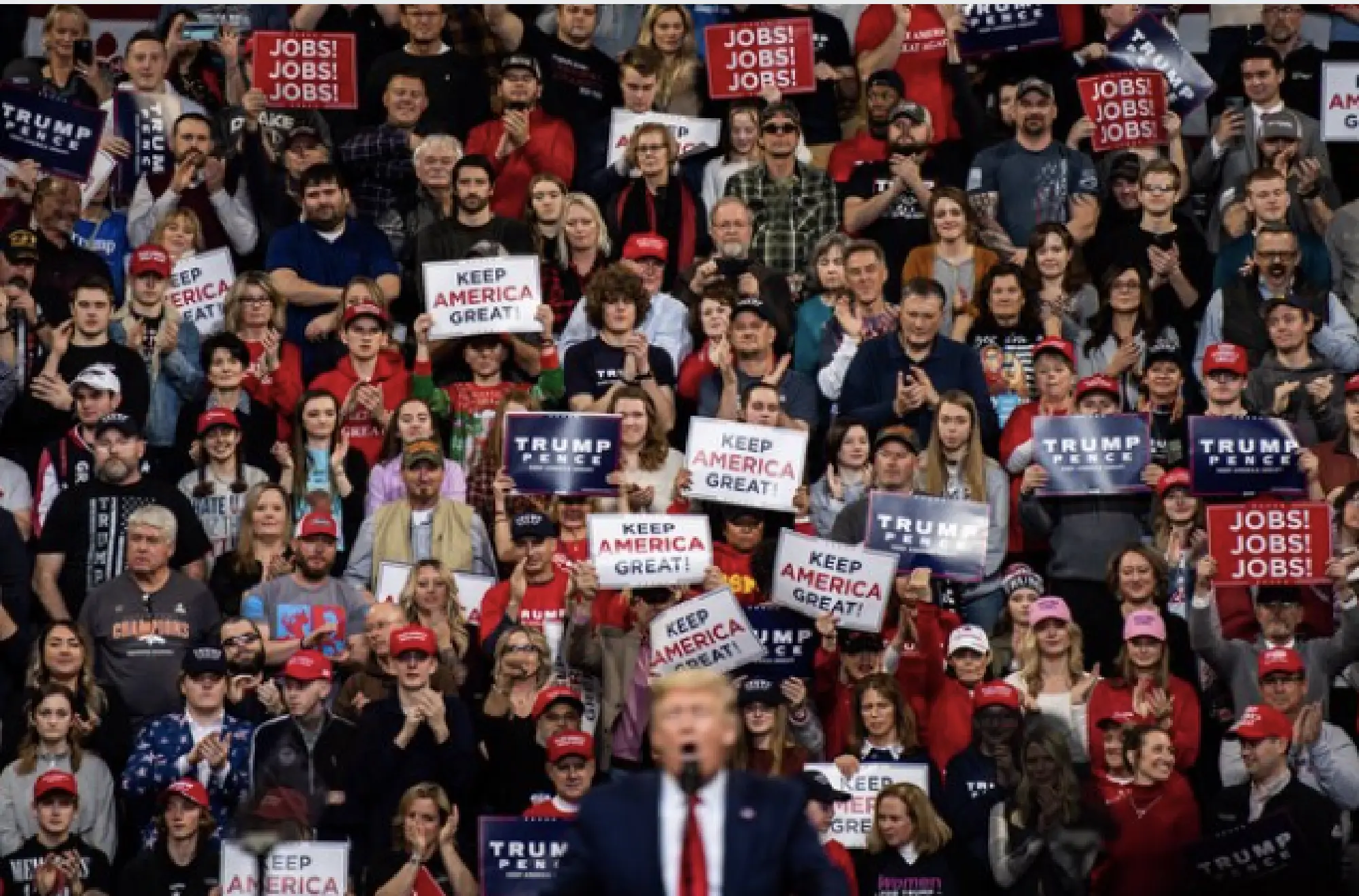 Supporters at the Knapp Center in Des Moines cheer President Donald Trump in January. MUST CREDIT: Washington Post photo by Salwan Georges