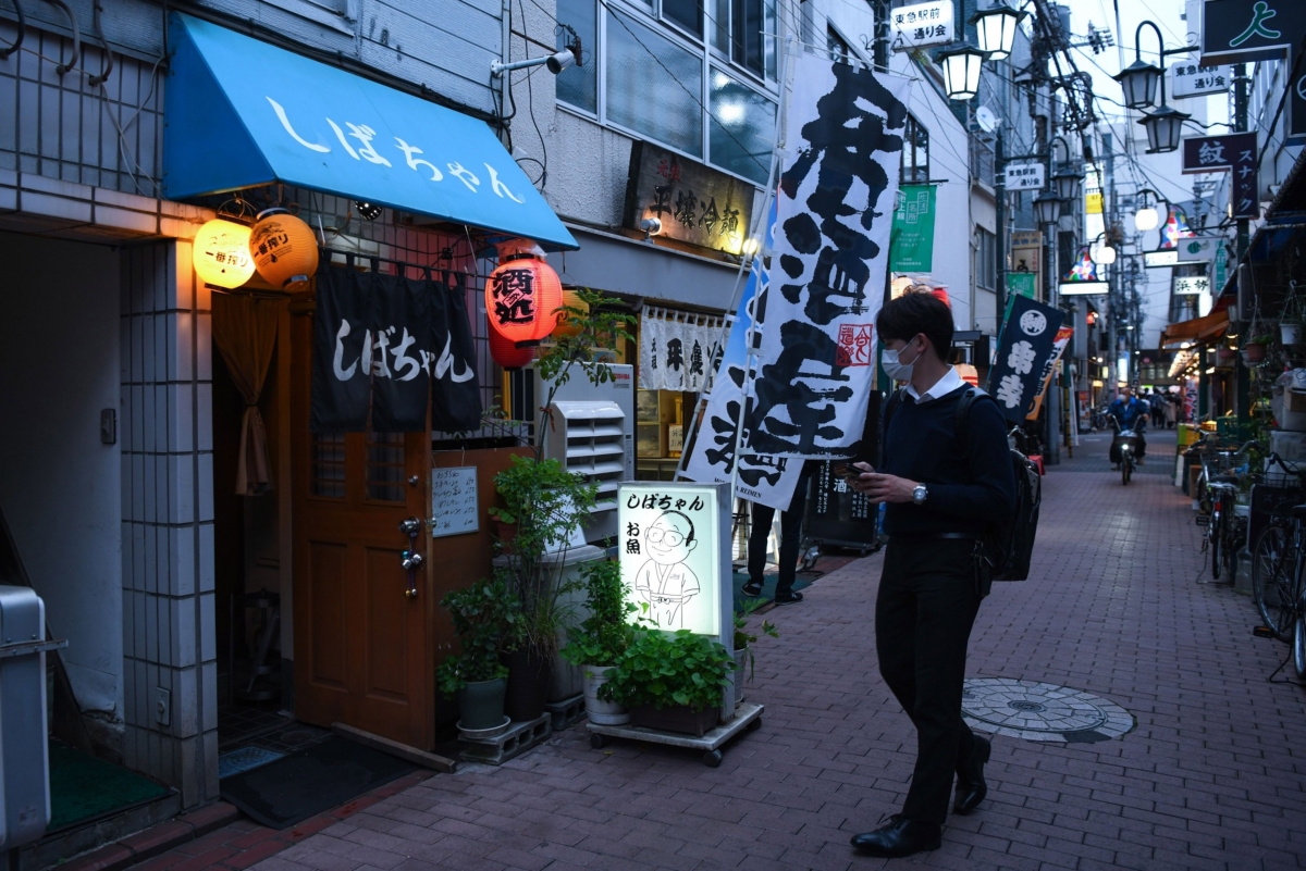 A person walks past a restaurant in the Kamata district of Tokyo on Friday, May 22, 2020. MUST CREDIT: Bloomberg photo by Noriko Hayashi