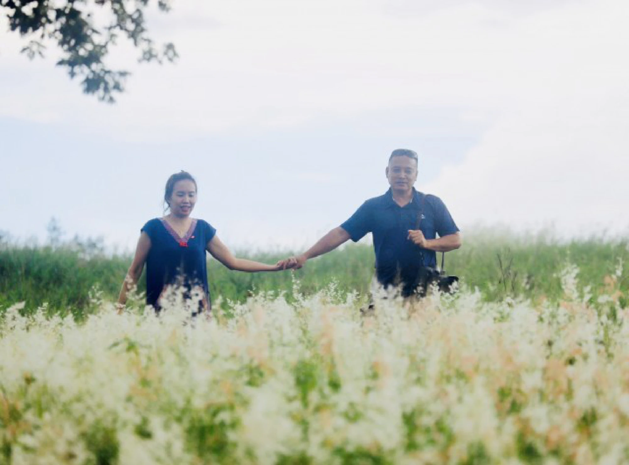 Wang Nam Kheow hills covered in bright blooms