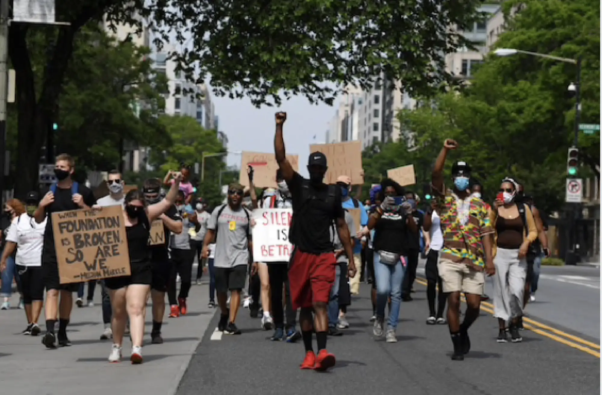 Demonstrators march down K Street NW as large protests over the death of George Floyd were expected on Saturday across the nation. MUST CREDIT: Washington Post photo by Matt McClain