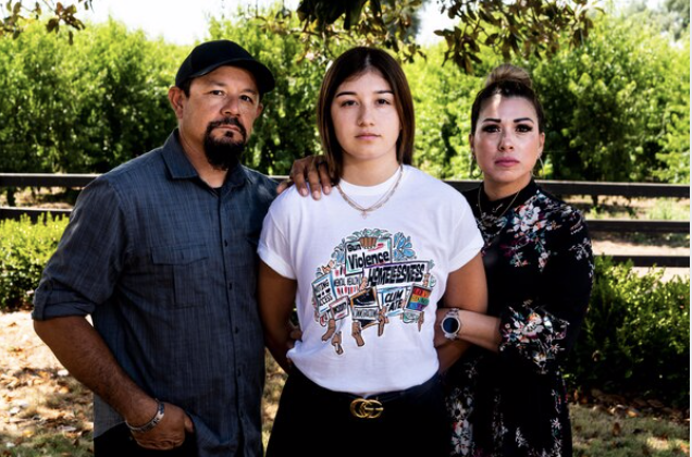 Black Lives Matter organizer Gisselle Quintero, 19, stands in Marysville, Calif., with her politically conservative parents, Wilfredo and Elizabeth Quintero, who support and respect her activism. MUST CREDIT: Washington Post photo by Melina Mara