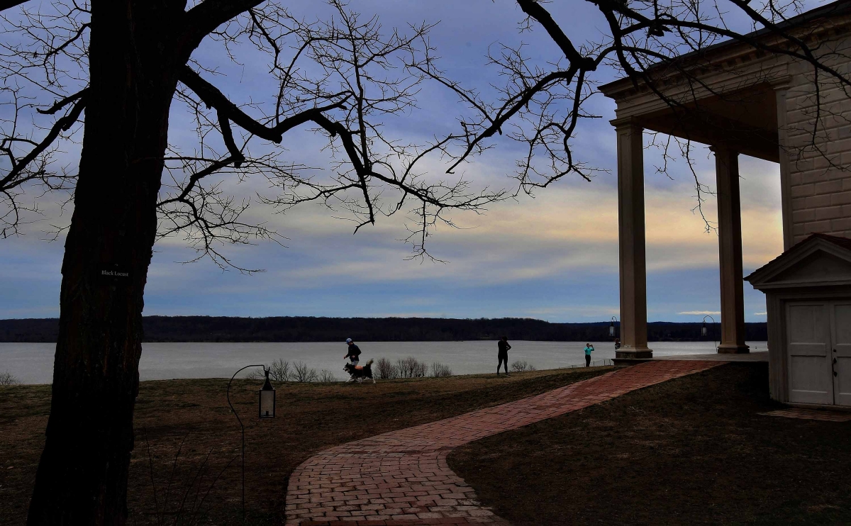 While the mansion at Mount Vernon remains closed, the grounds of George Washington's estate remain open, including the piazza with its views of the Potomac River. MUST CREDIT: Washington Post photo by Michael S. Williamson