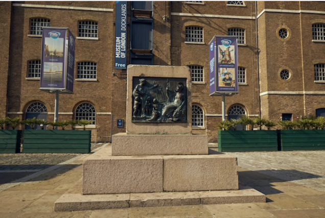An empty plinth, where the statue of 18th century slave owner Robert Milligan used to be, stands in front of the Museum of London Docklands in London on June 23, 2020. MUST CREDIT: Bloomberg photo by Olivia Harris.