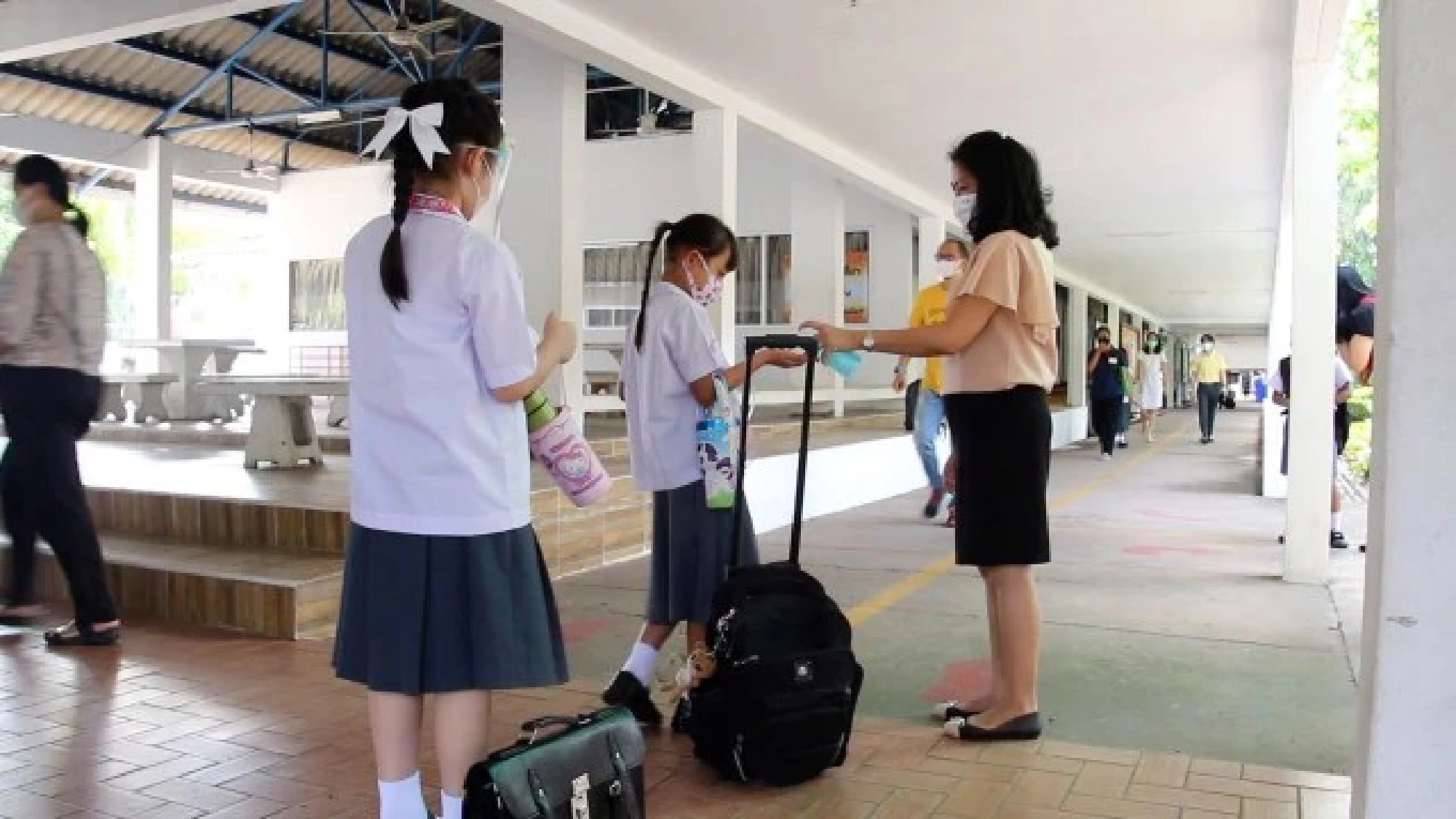 Students adjust to the new normal as schools reopen