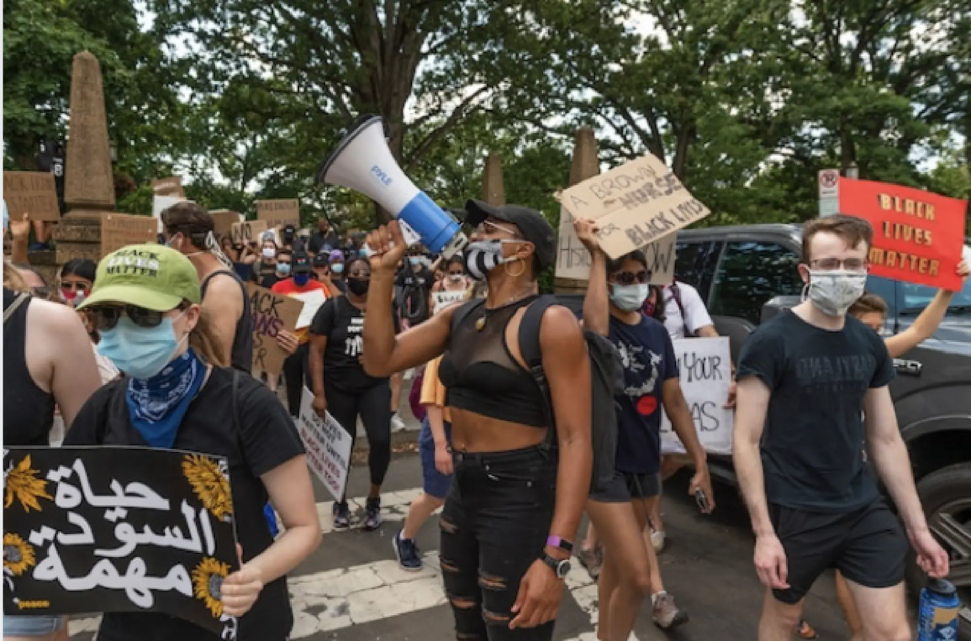 Hilda-M Jordan of DC Protests leads a chant at Malcolm X Park in Washington, D.C., on Saturday. MUST CREDIT: Photo by Craig Hudson for The Washington Post