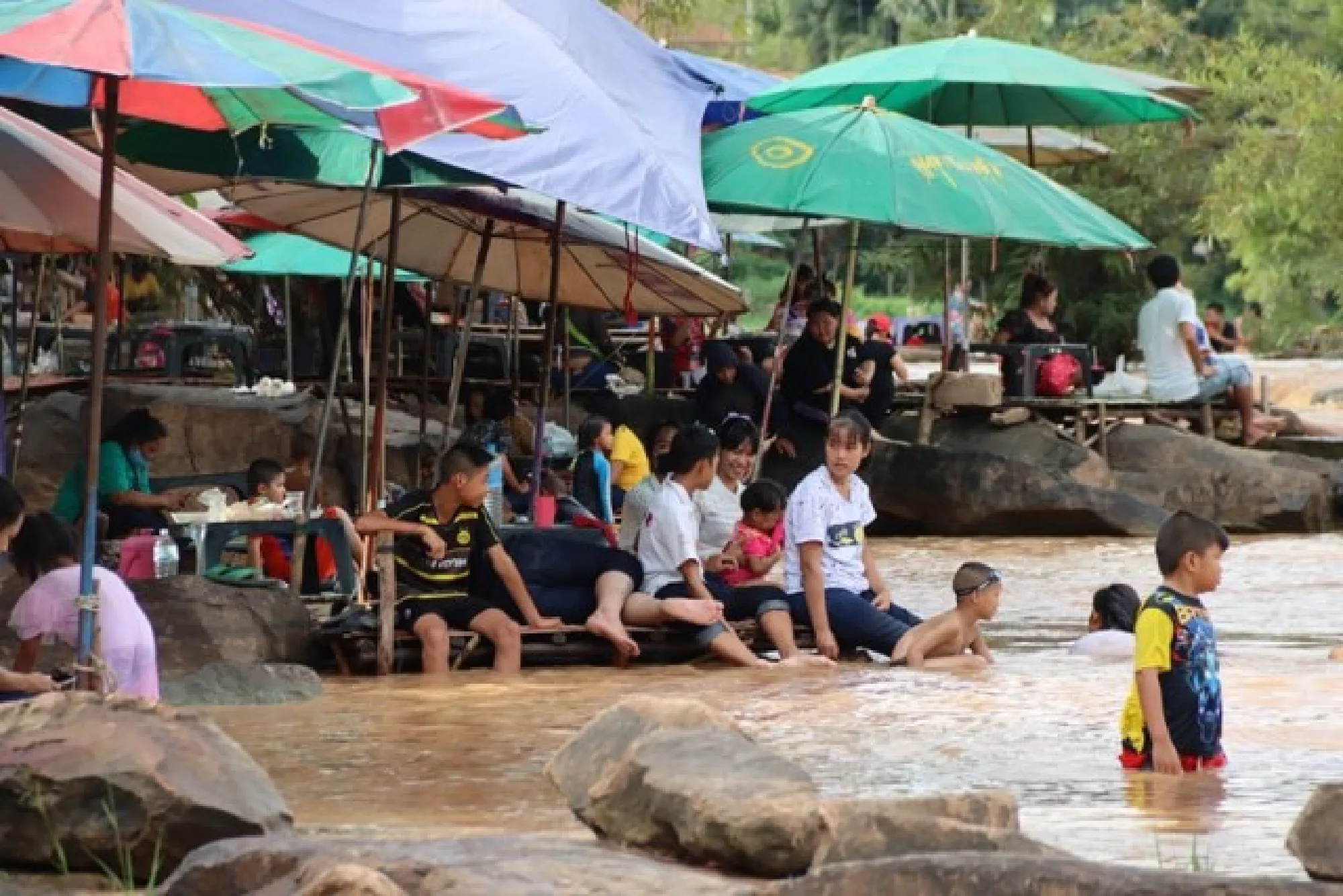 Kaeng Song Waterfall roars back to life as tourists descend on the area